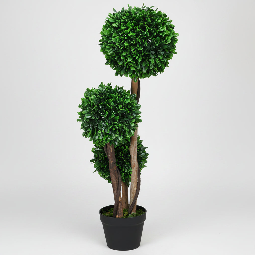Artificial topiary plant with three spherical green balls on a white background