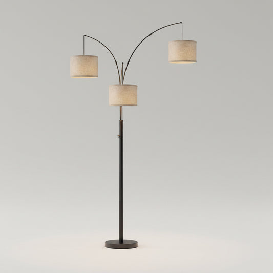 Floor lamp with three lampshades in a bedroom setting